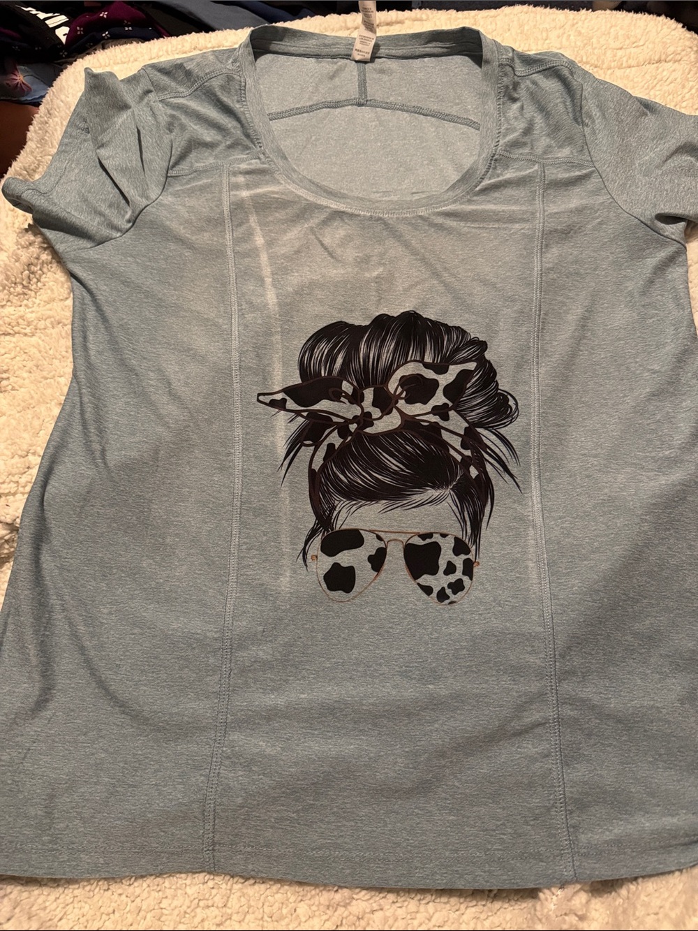 Marika Light Blue Graphic Tee with Messy Bun & Leopard Sunglasses